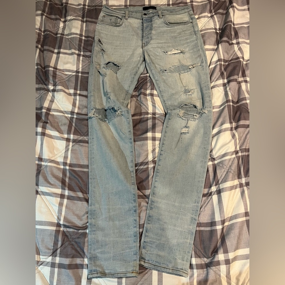 AMIRI Faded Blue Ripped Slim Jeans